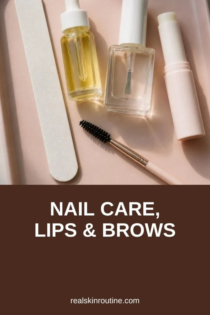 Nail file, cuticle oil, lip balm and brow brush on a pink tray, pin for nail care
