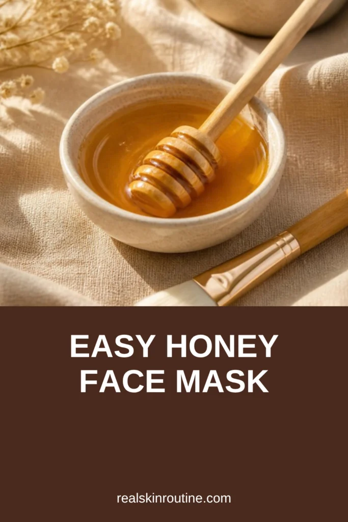 Ceramic bowl of golden honey with a wooden dipper and mask brush on linen, pin for honey face mask